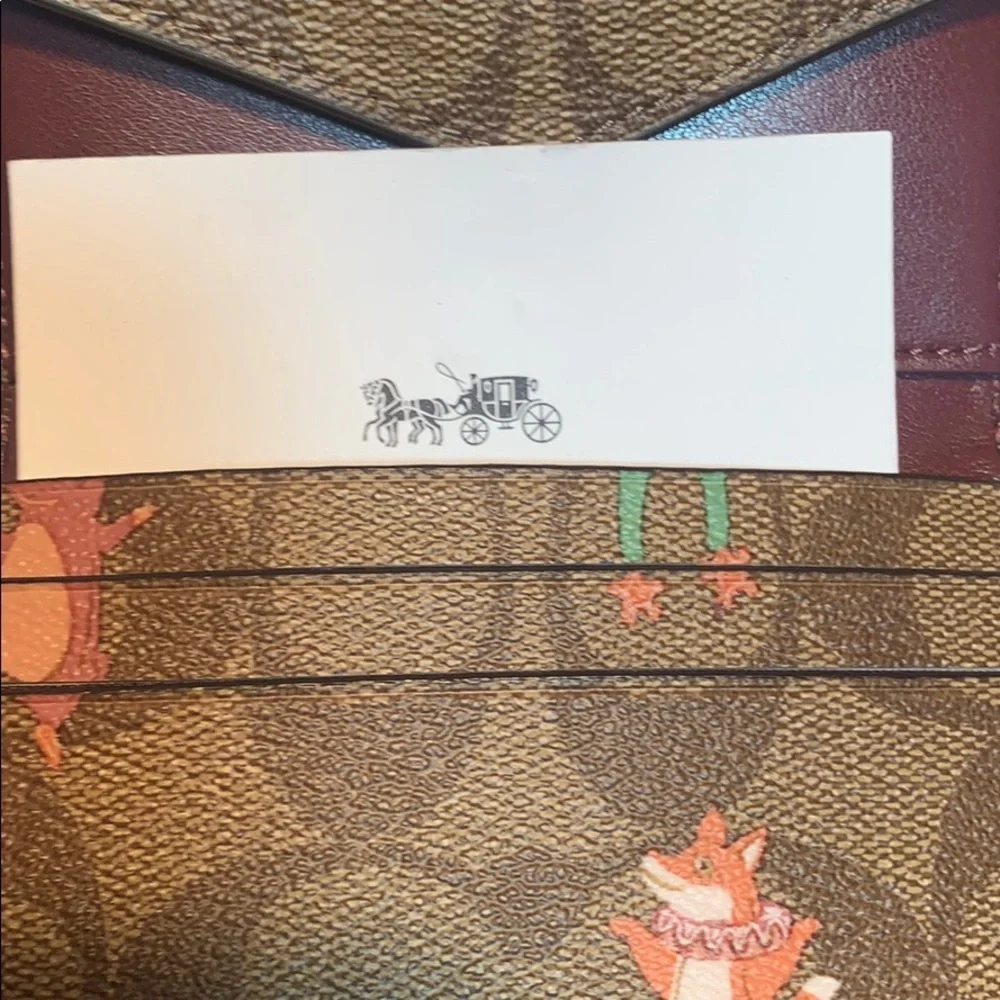NWT Coach limited edition leashed wallet w/mirror